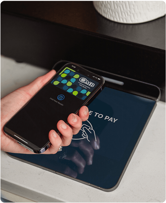 a person is making a payment using contactless payment