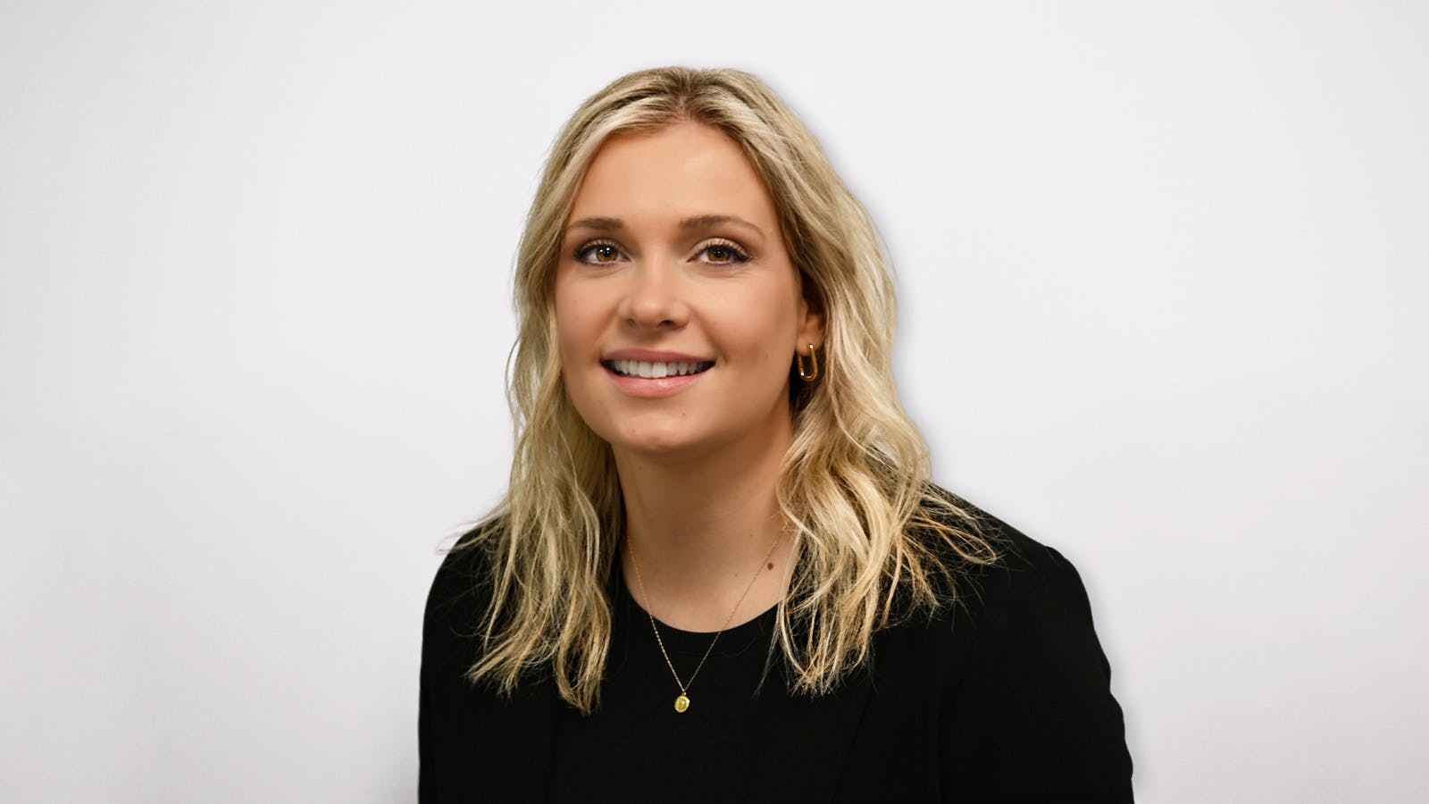 Deziree Ives wearing a black top